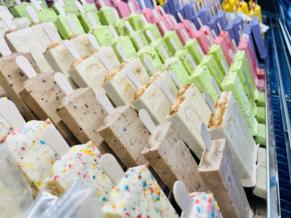 Rows of fresh paletas in the Paleta Bar display case